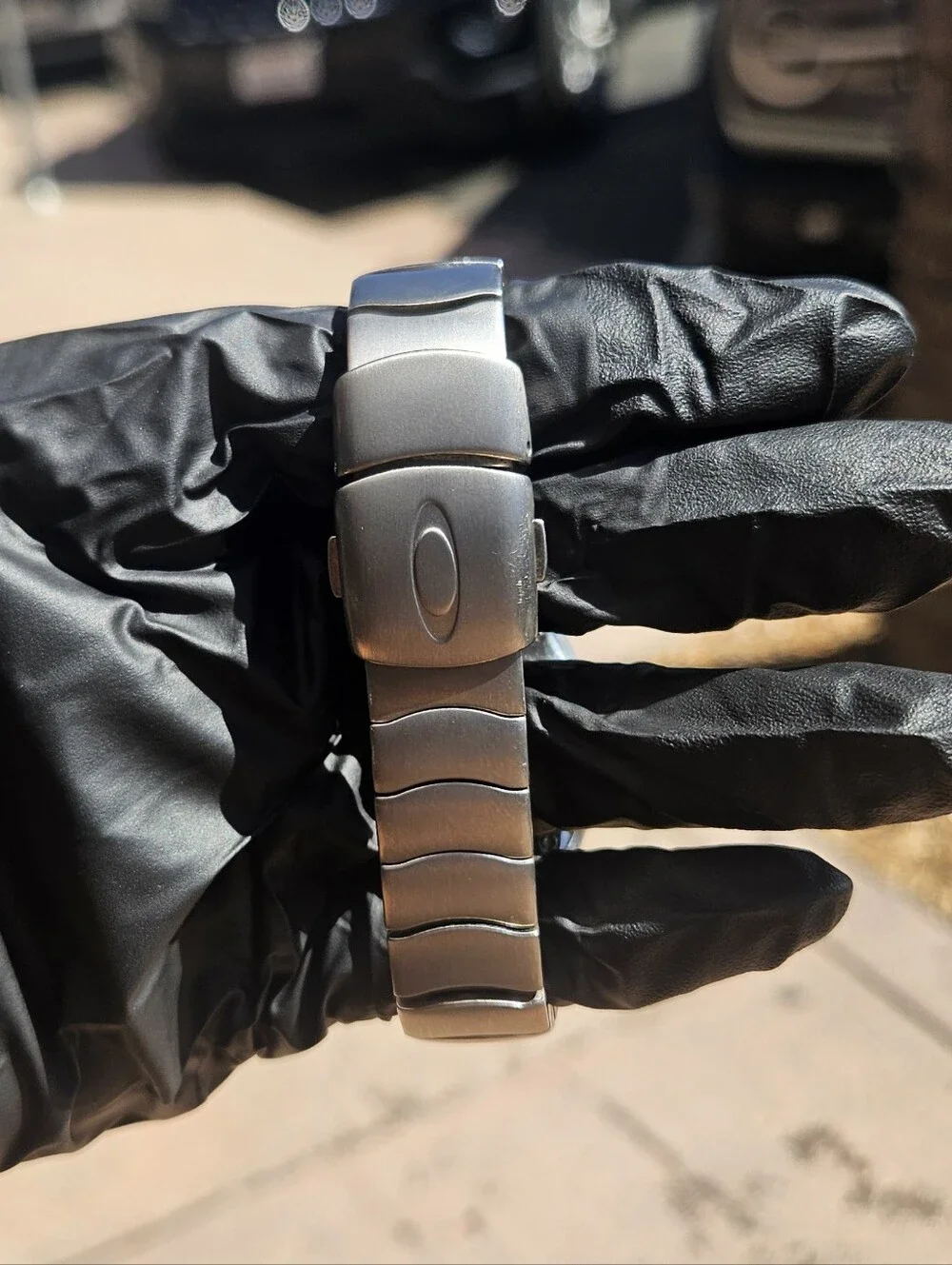 Oakley Timebomb Icon Titanium Watch with Gold Dial.